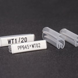WT1 / 15 Oznacznik transparentny z kieszenią na profil PP945, śr. 2,5 - 4,7 mm, dł 15 mm, op. 200 szt.