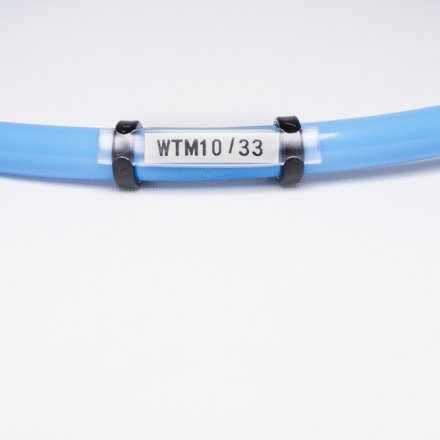 WTM 10/33 Oznacznik kablowy na etykietę płaską PP*45 wys.4,5 mm dł. 33 mm op.100 szt